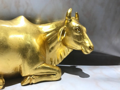 The Golden Cow, Wooden Pure Gold Plated Sitting Cow Statue - Malji Arts